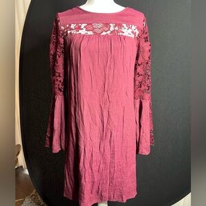 Adorable, maroon tunic dress. Lace detail. New with tags. Size medium.